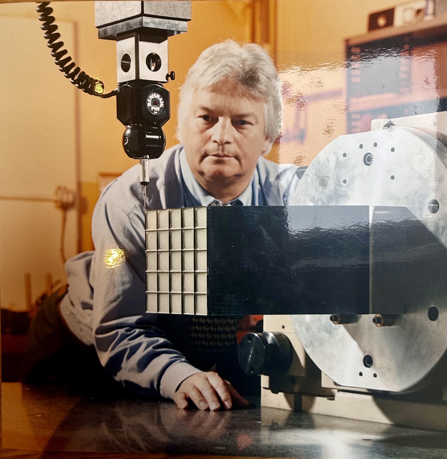 Brian Smith holding a CMS ECAL crystal matrix at RAL